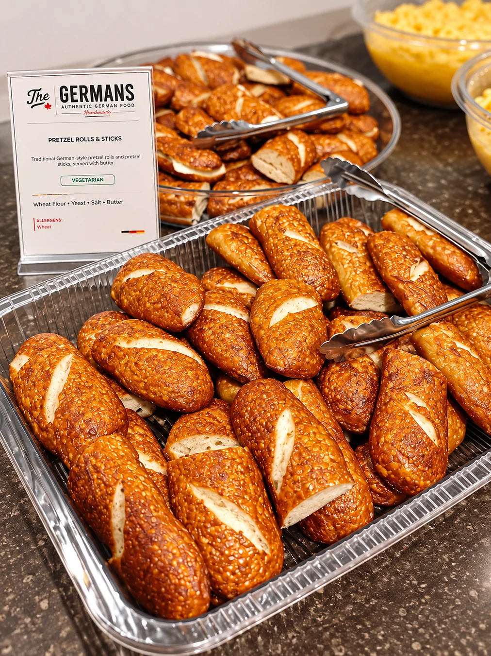 Pretzel rolls and pretzel sticks prepared for catering